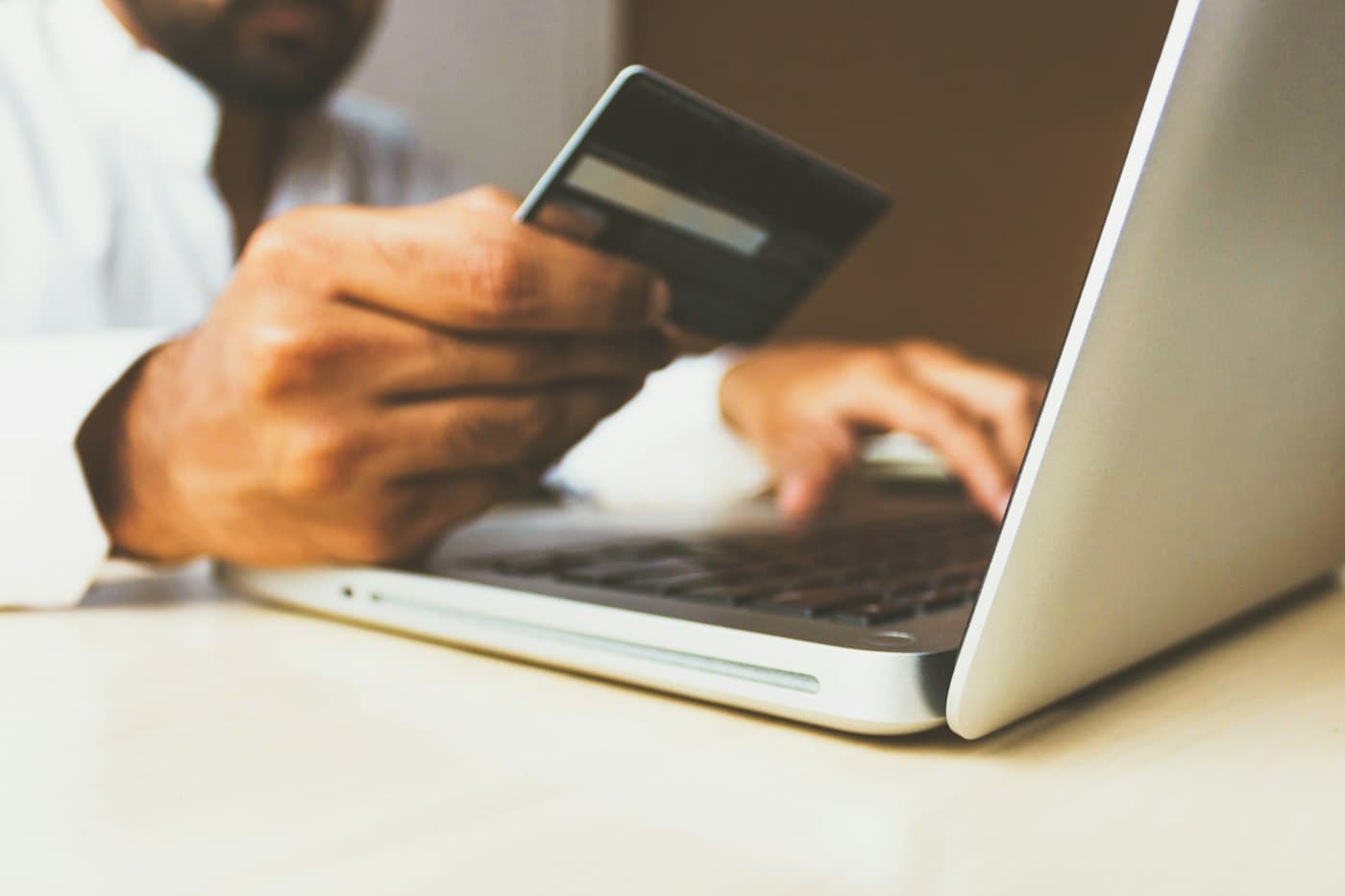 Customer completing a secure checkout on a laptop